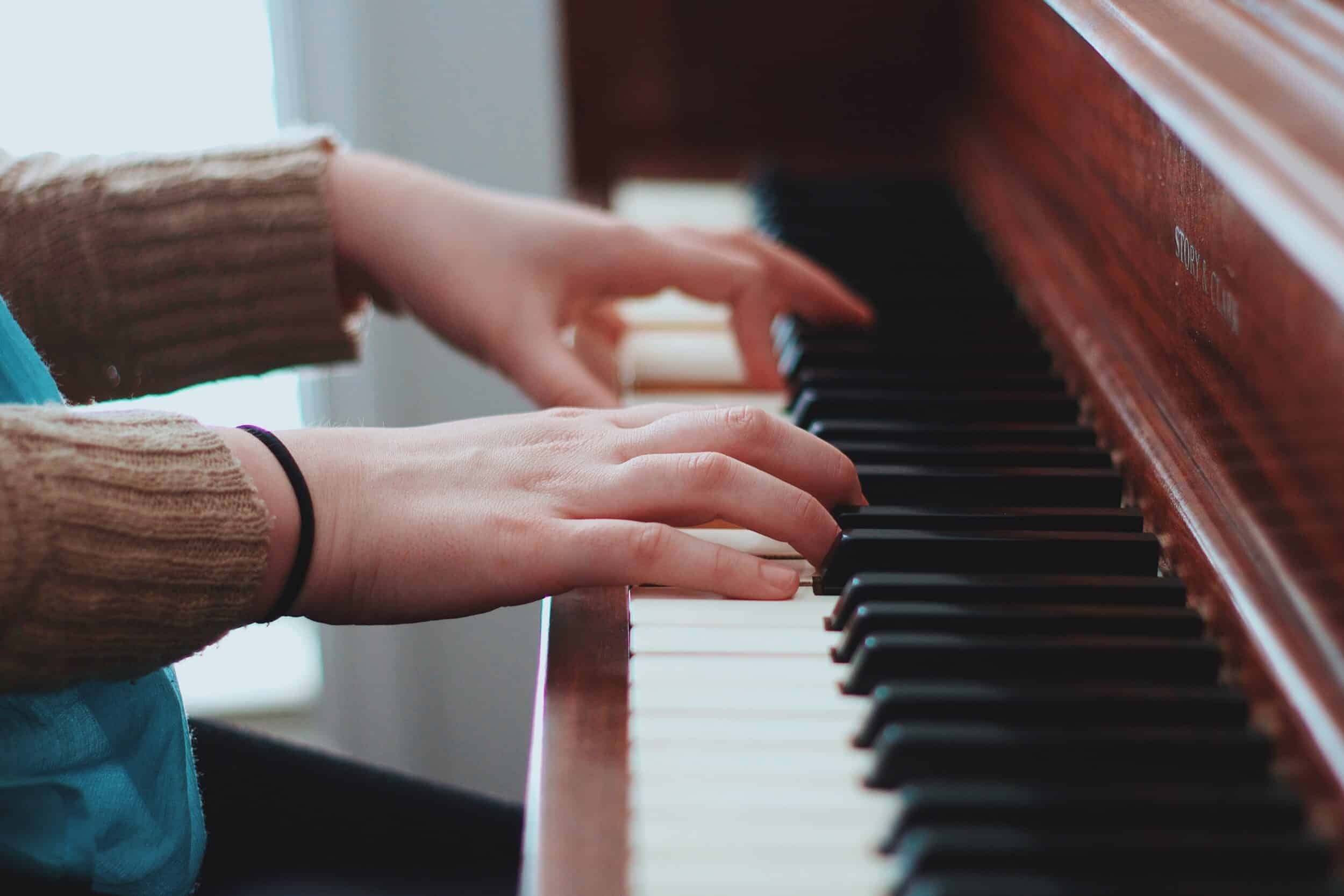 5420289 piano pianist playing hands cuff practise instrument finger play music bokeh blur keyboard key hand story amp clark sound creative commons images